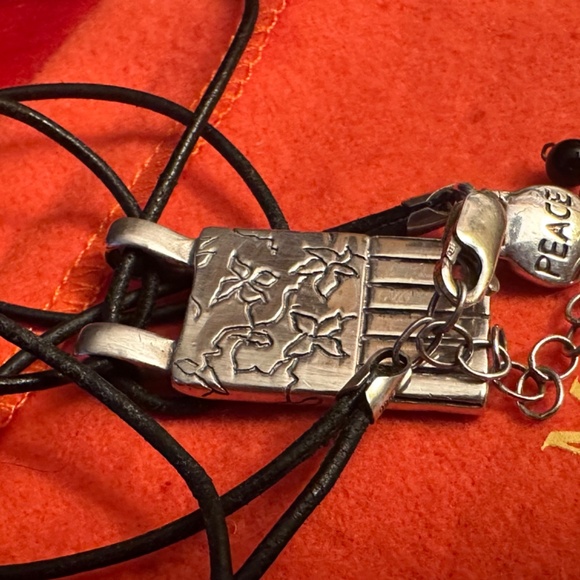 WOW POSHMARK - Authentic Me&Ro Sterling Floral Peace Pendant Leather Cord
